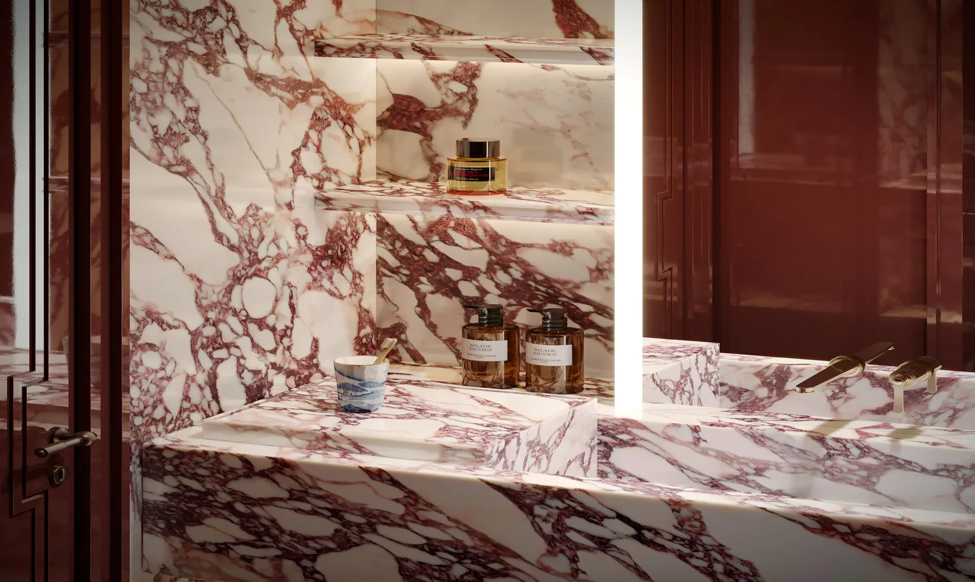 Powder room in burgundy lacquer and marble — Carlyle Residences Dubai